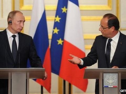 Description: Tổng thống Nga Putin và Tổng thống Pháp Hollande